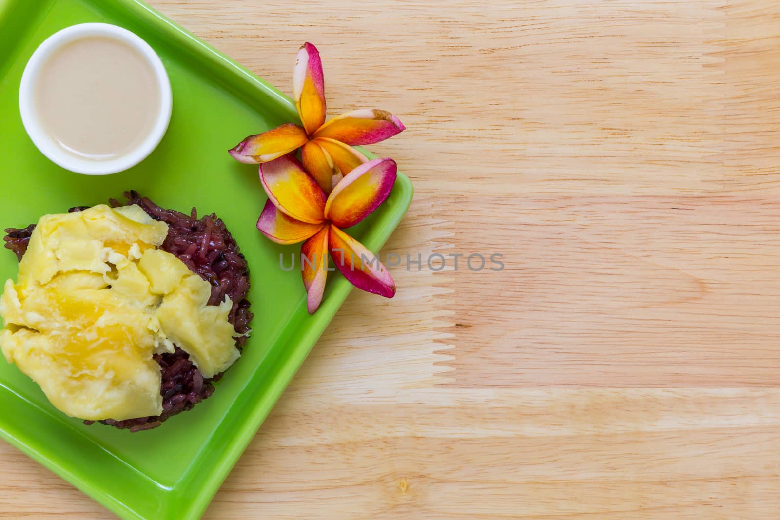 Durian with sticky rice is famous traditional Thai dessert menu.