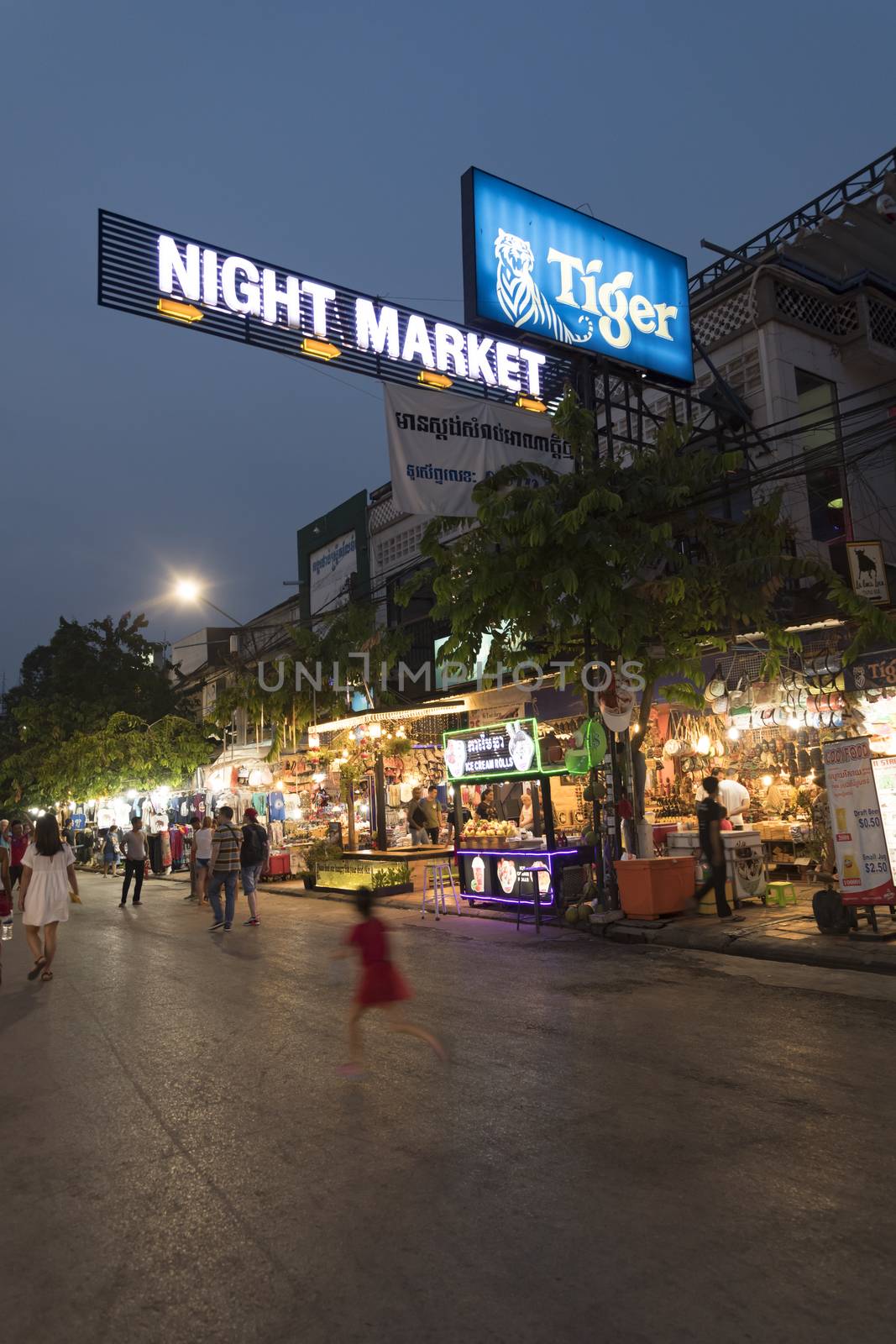 Siem Reap, Cambodia, 26 March 2018. Nice clear and hot evening at the Night Market. Tourists are coming for shopping, dinning and pubs.