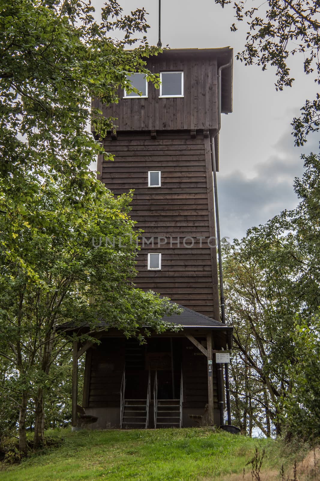 wooden lookout tower on mountain