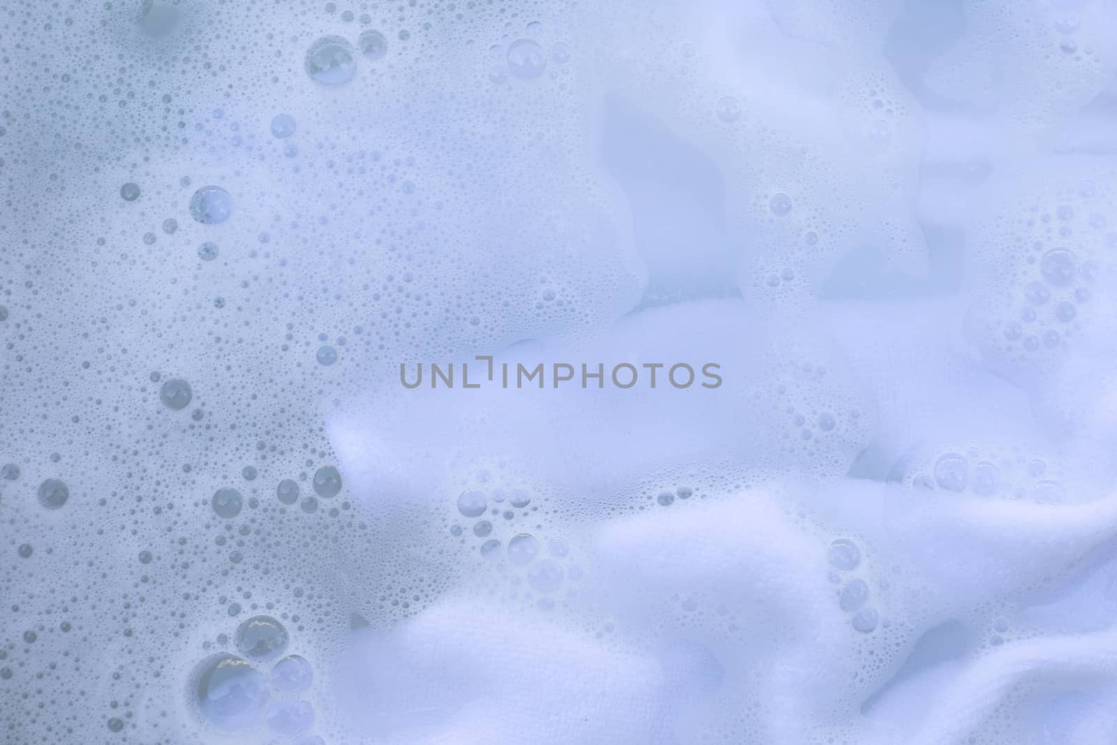 Soak a cloth before washing, white cloth