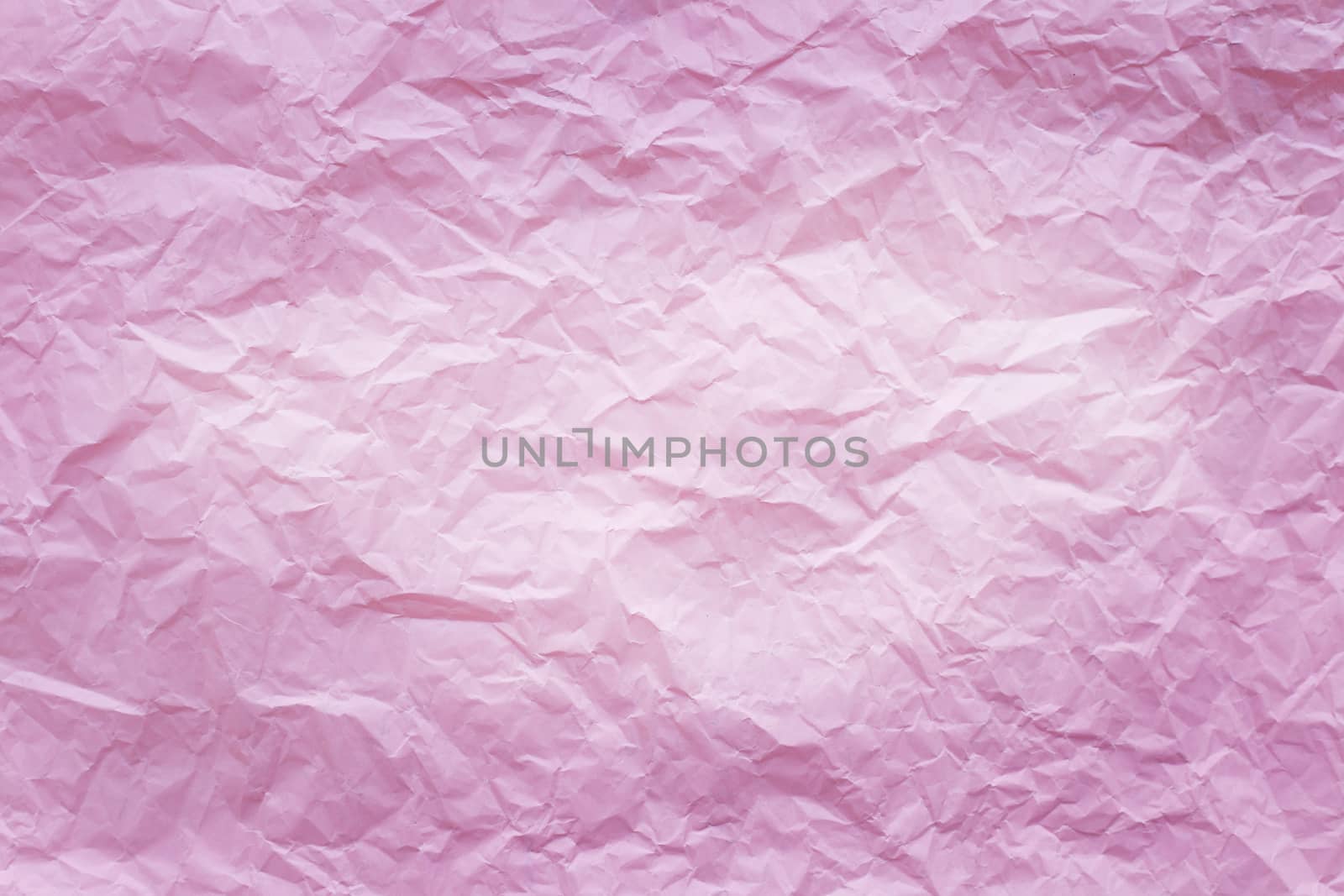Pink crumpled recycle paper background