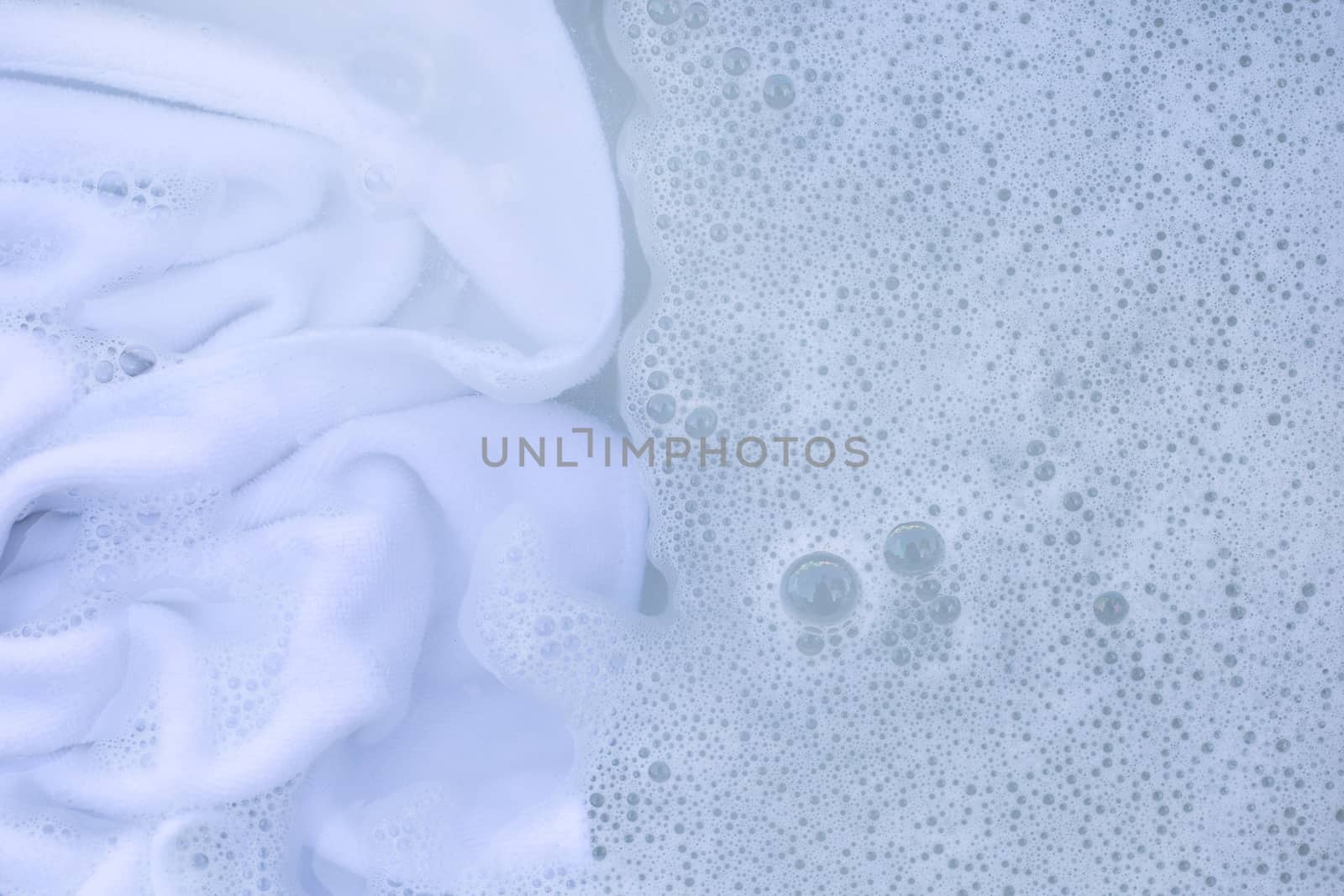 Soak a cloth before washing, white cloth
