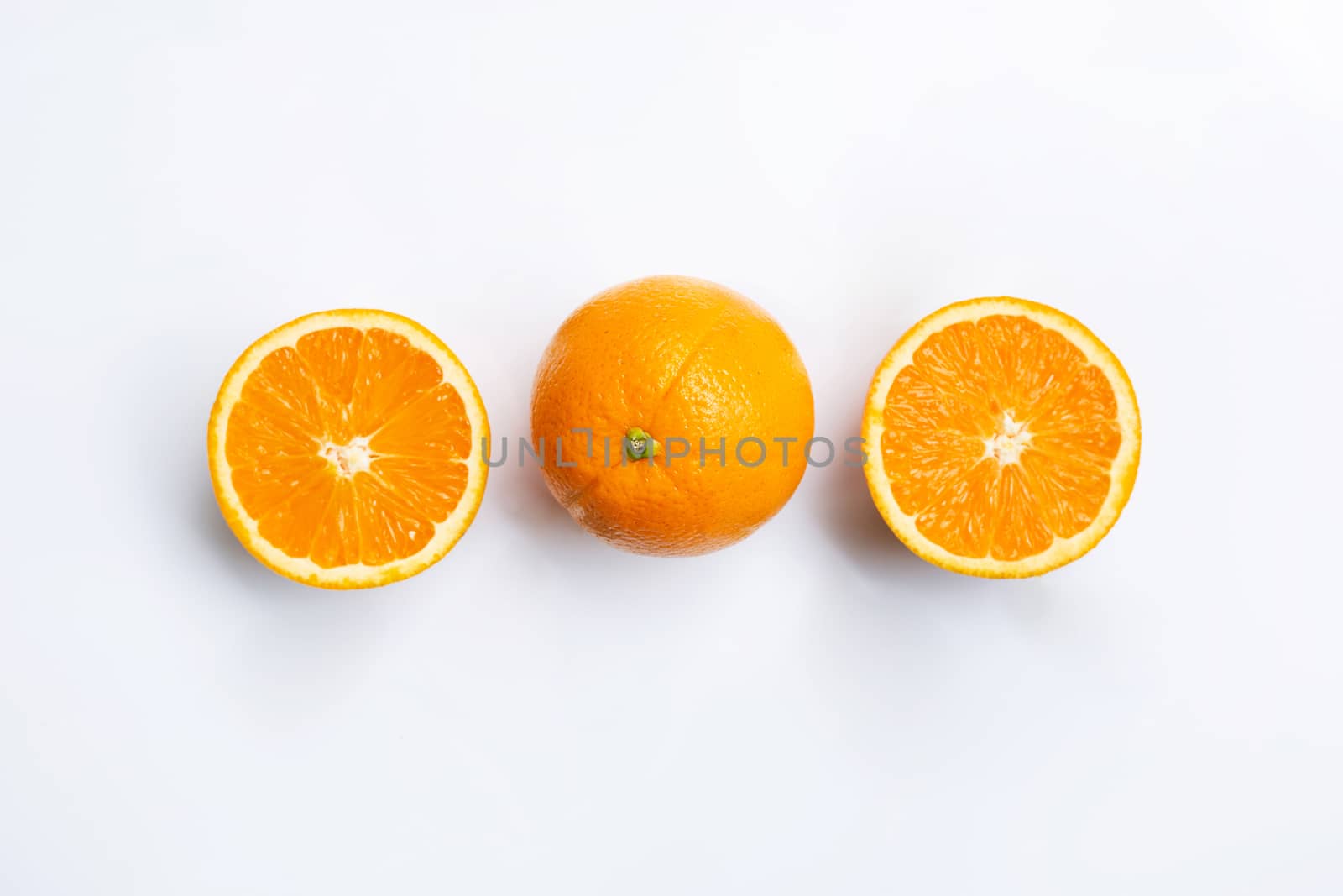 Top view of orange fruits isolated on white background.
