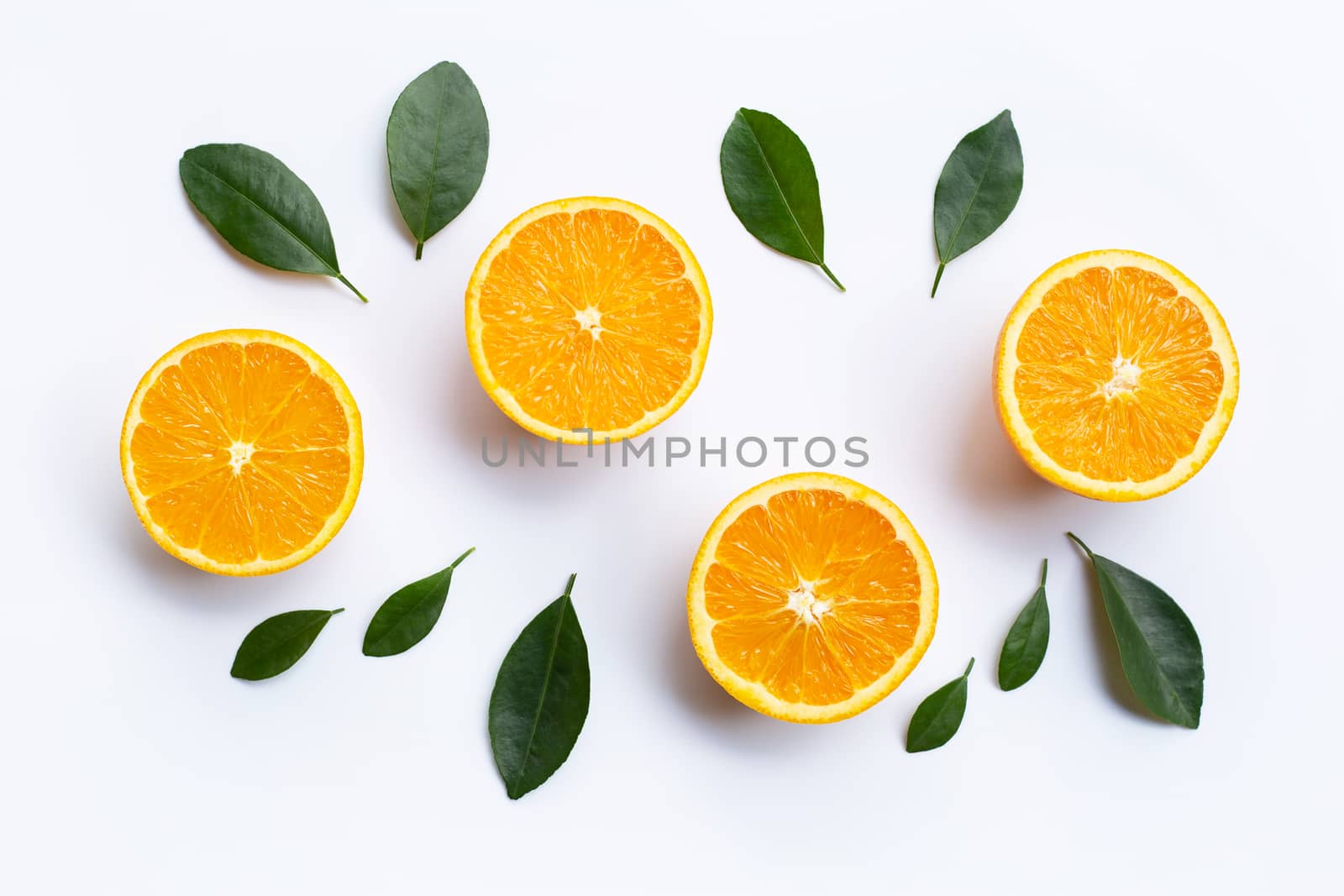 Top view of orange fruits and leaves isolated on white background.