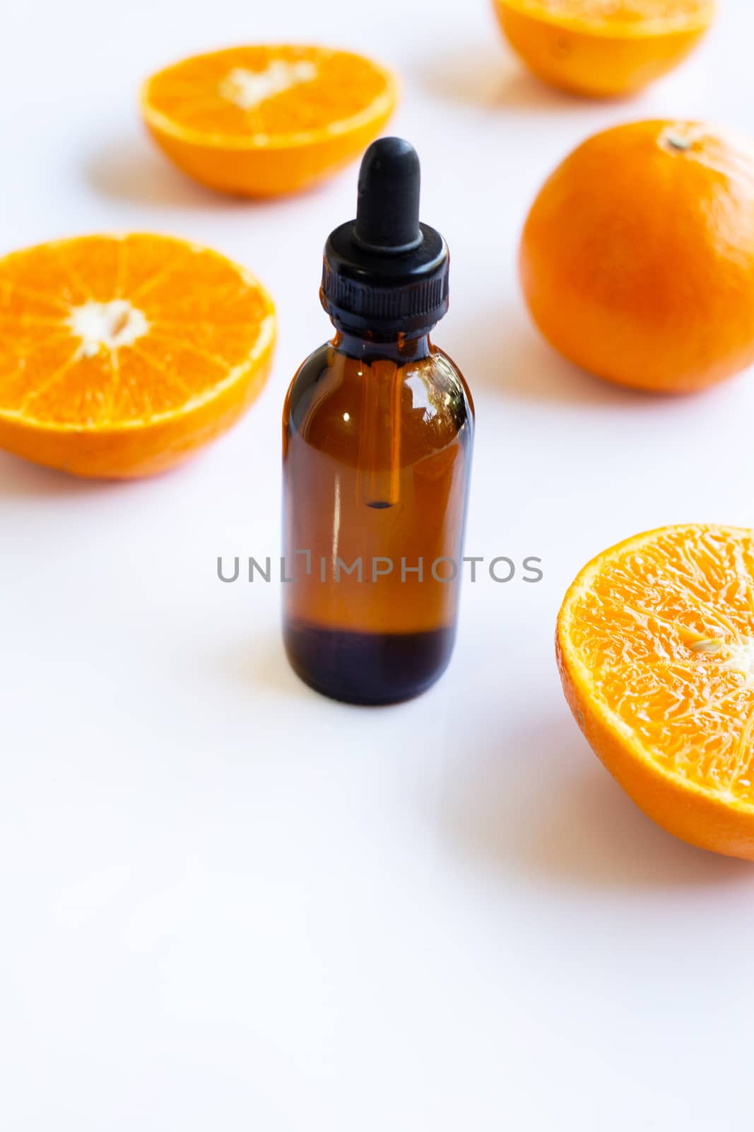 Essential oil with orange. Copy space