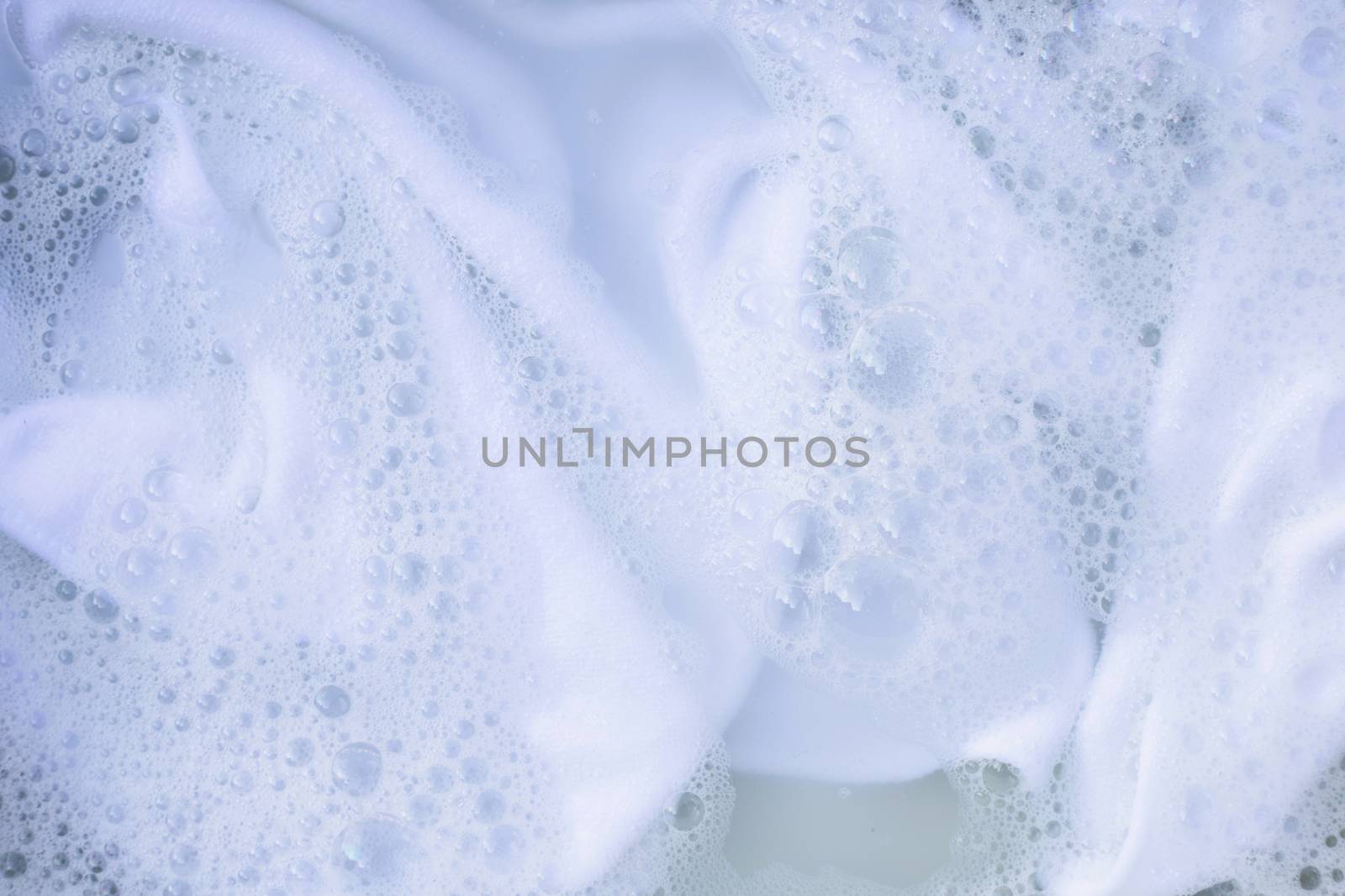 Soak a cloth before washing, white cloth
