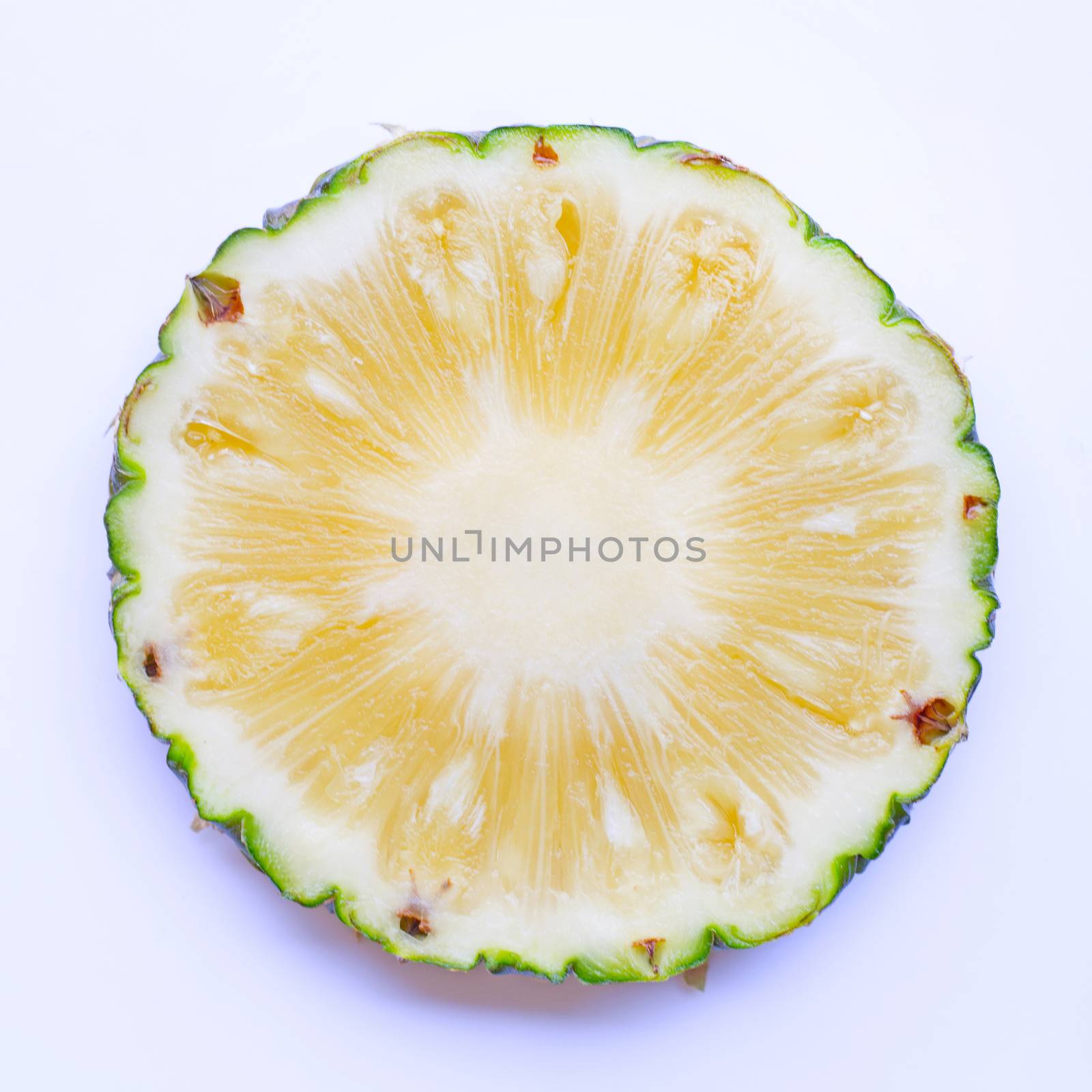 Pineapple slice on white background. by Bowonpat