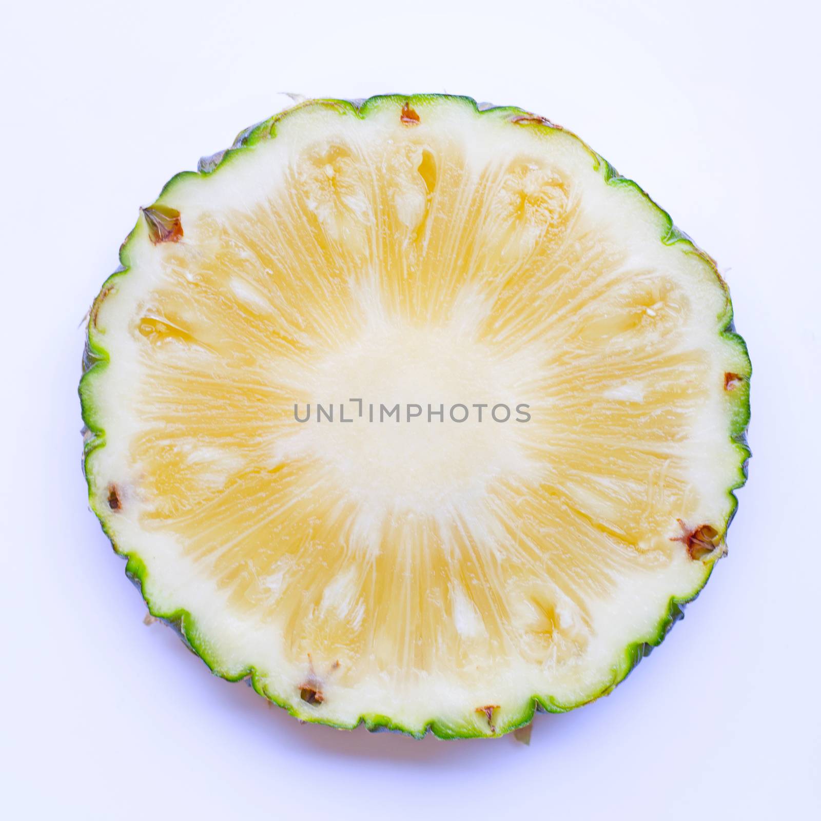 Pineapple slice on white background.