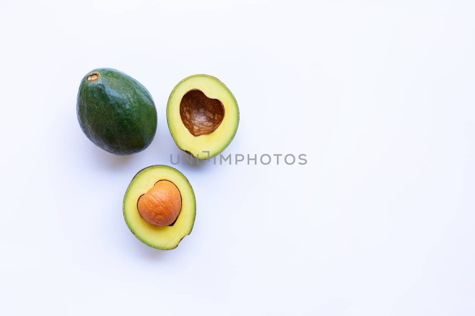 Avocado on white background. Heart shape, Copy space
