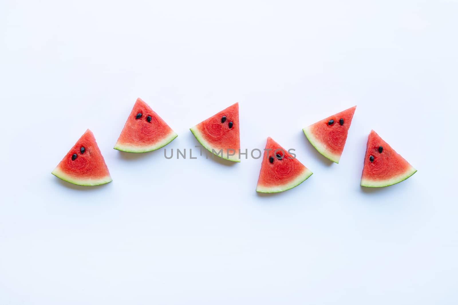 Sweet watermelon slices on white background