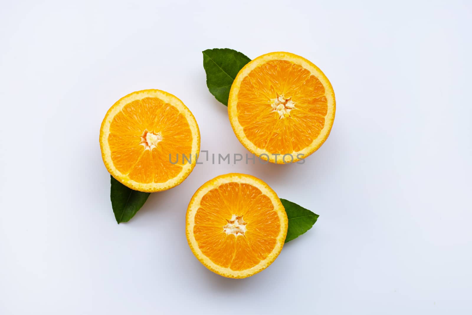 Fresh orange with leaves isolated on white background.  