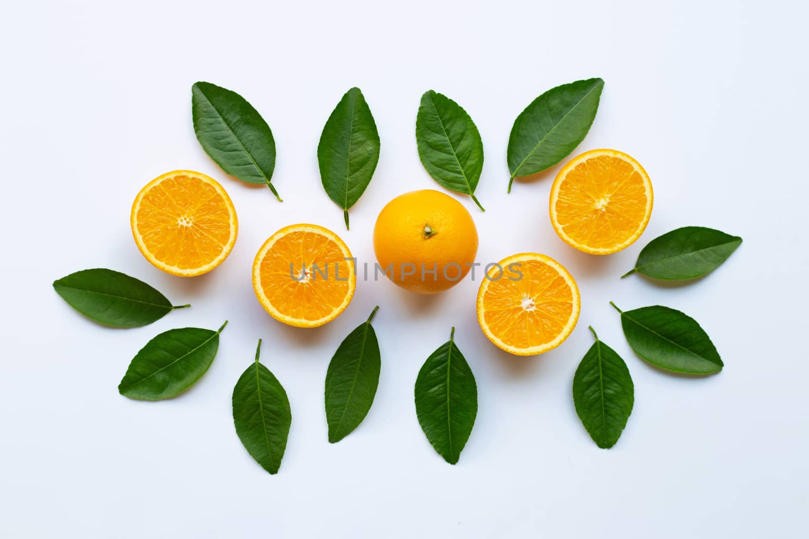 Fresh orange citrus fruit with leaves isolated on white background. Top view