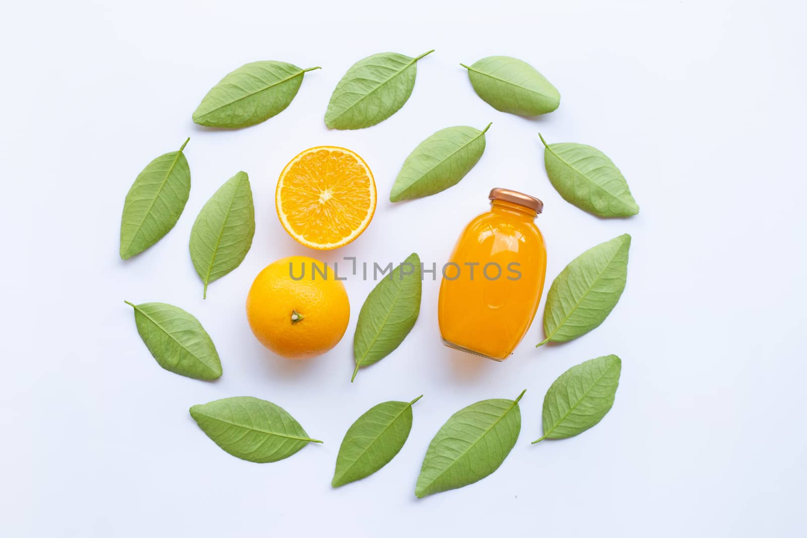Orange with  green leaves and Orange juice isolated on white background.  Top view