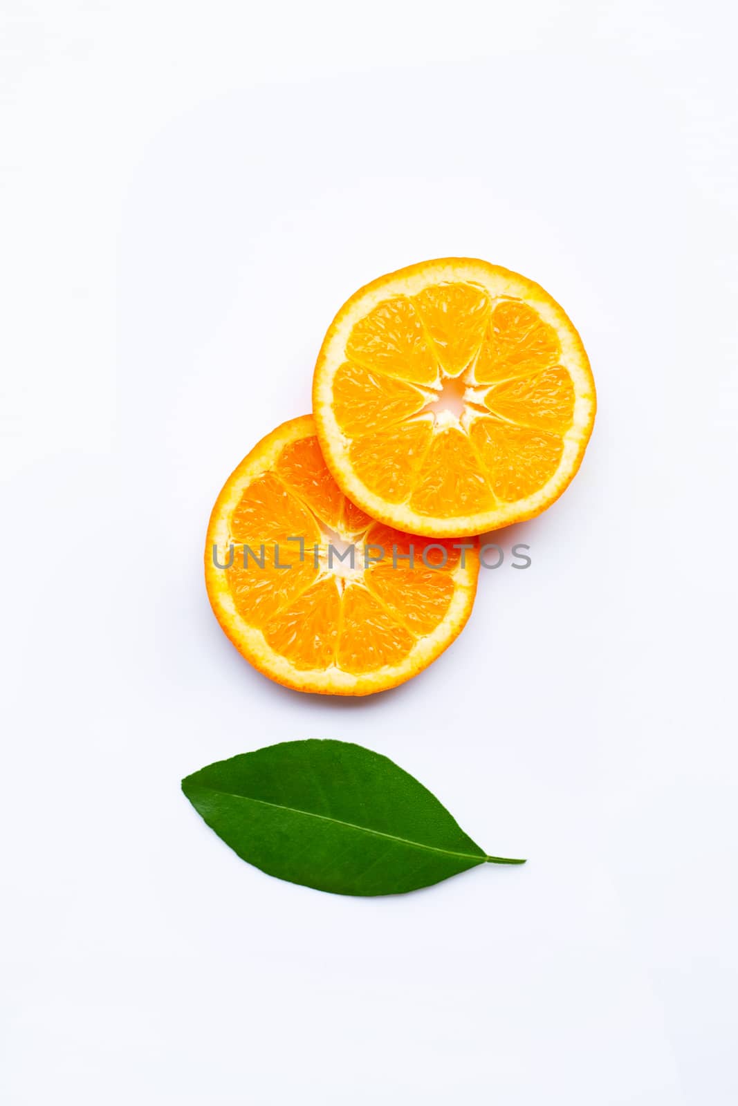 Fresh orange citrus fruit with leave on white background.  Top view
