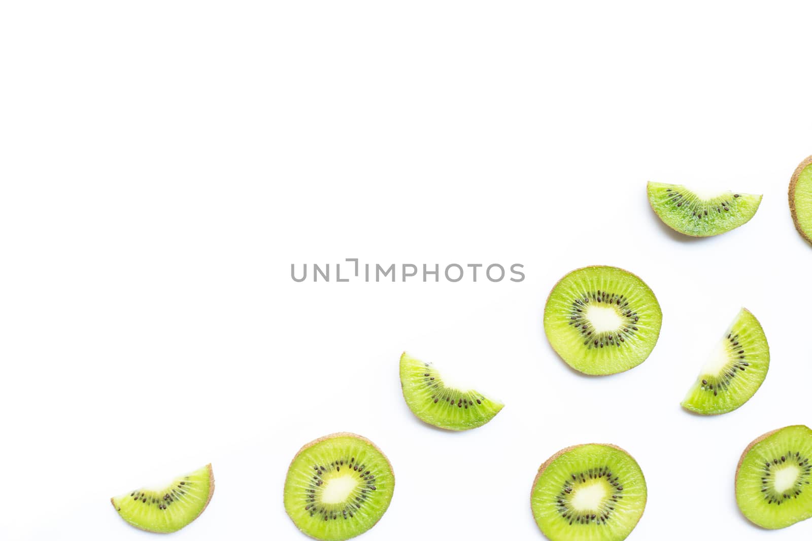 Kiwi fruit slices isolated on white background. Copy space