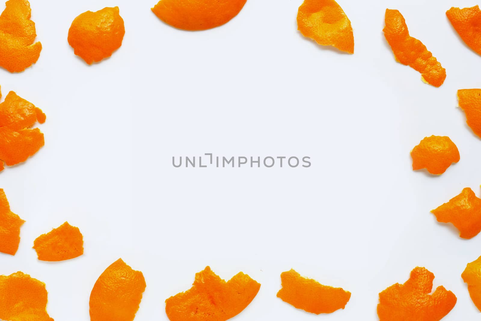 Frame made of mandarin peel isolated on white background