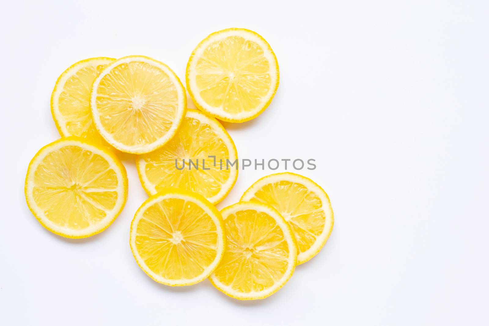 Fresh lemon slices on white background.