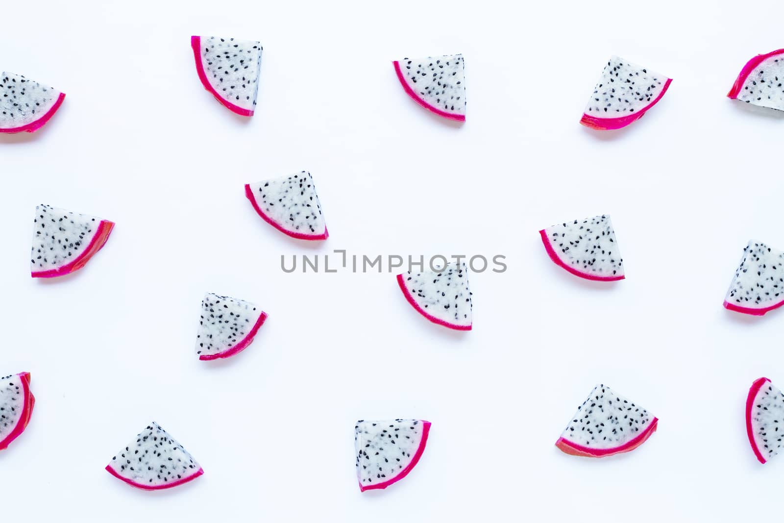Dragon fruit, pitaya slices isolated on white background.