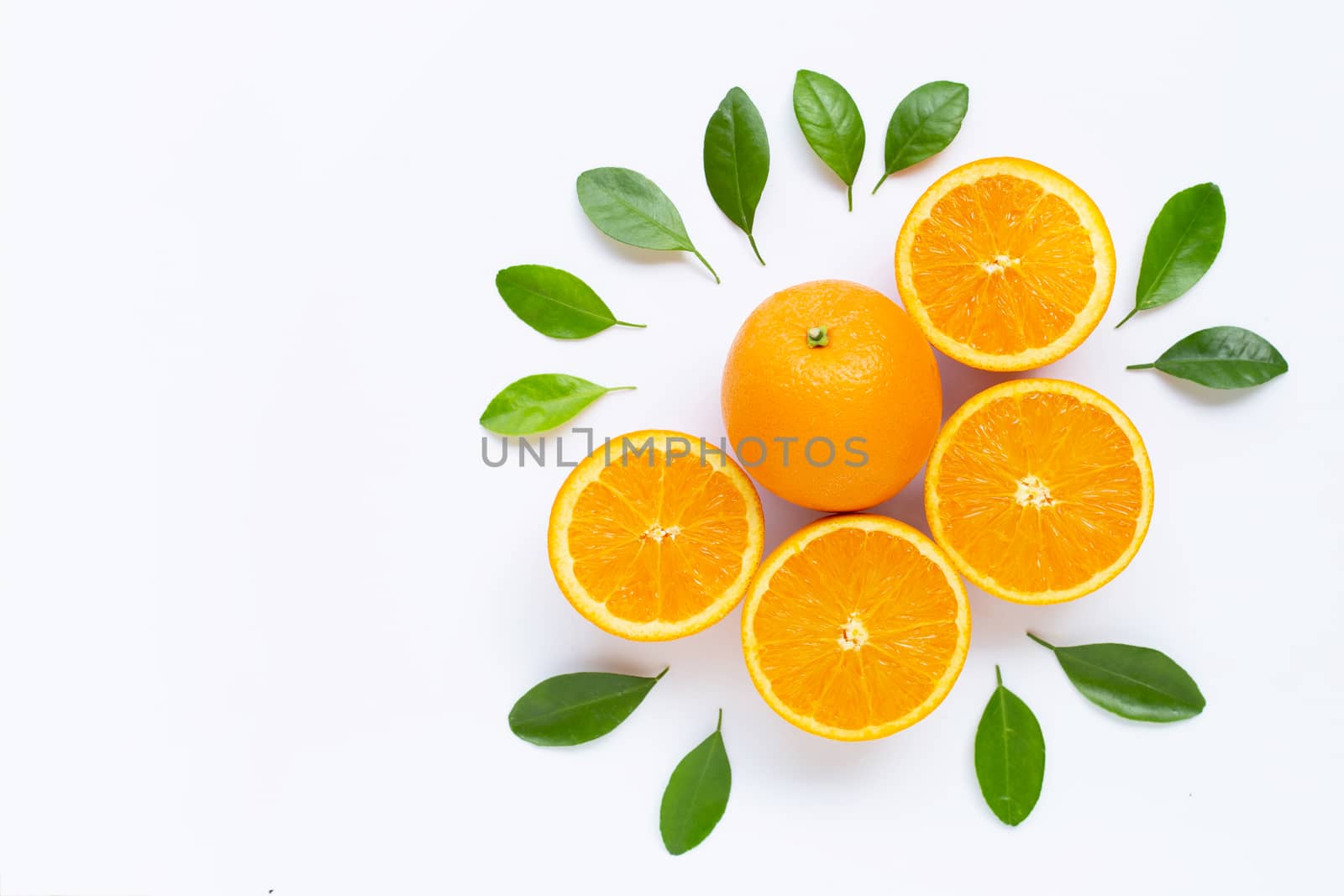 Fresh orange citrus fruit with leaves isolated on white background. Juicy and sweet