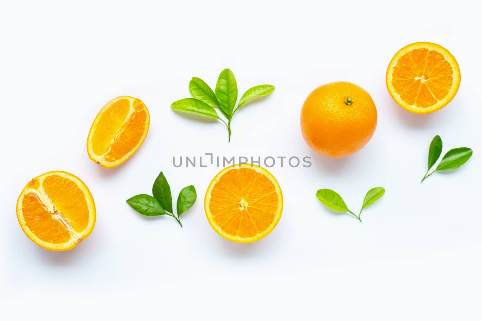 Fresh orange citrus fruit with leaves isolated on white background. Copy space