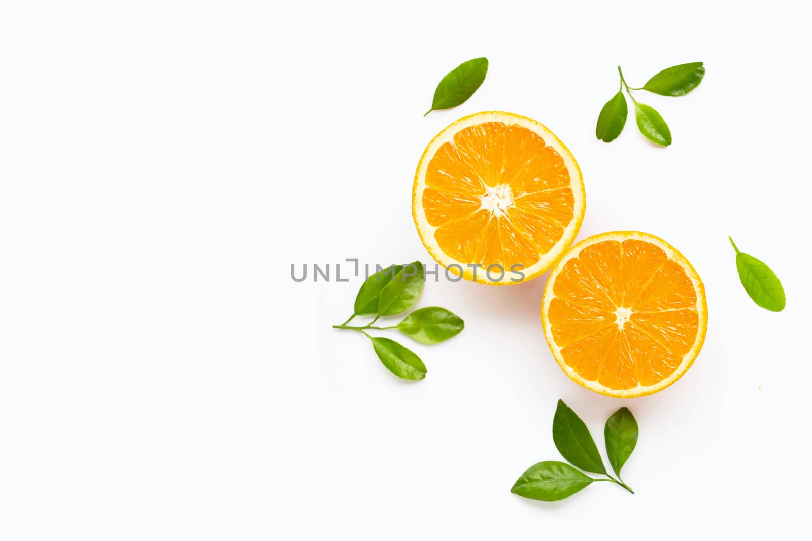 Fresh orange citrus fruit with leaves isolated on white background. Copy space