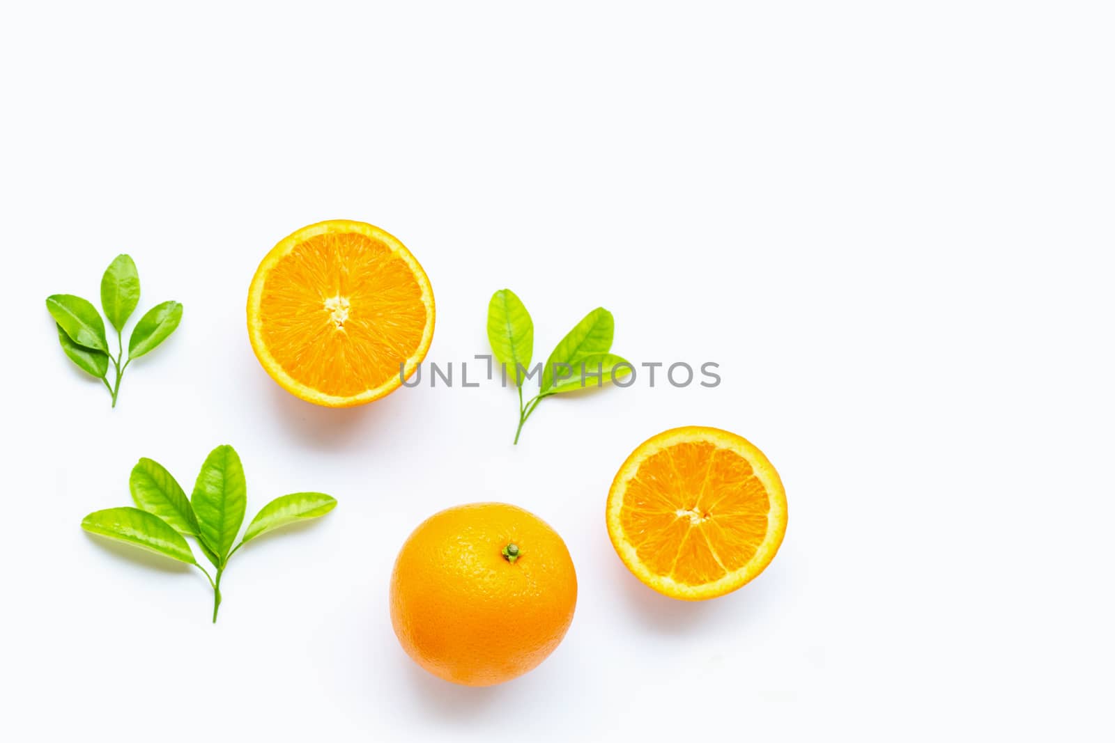 Fresh orange citrus fruit with leaves isolated on white background. Copy space