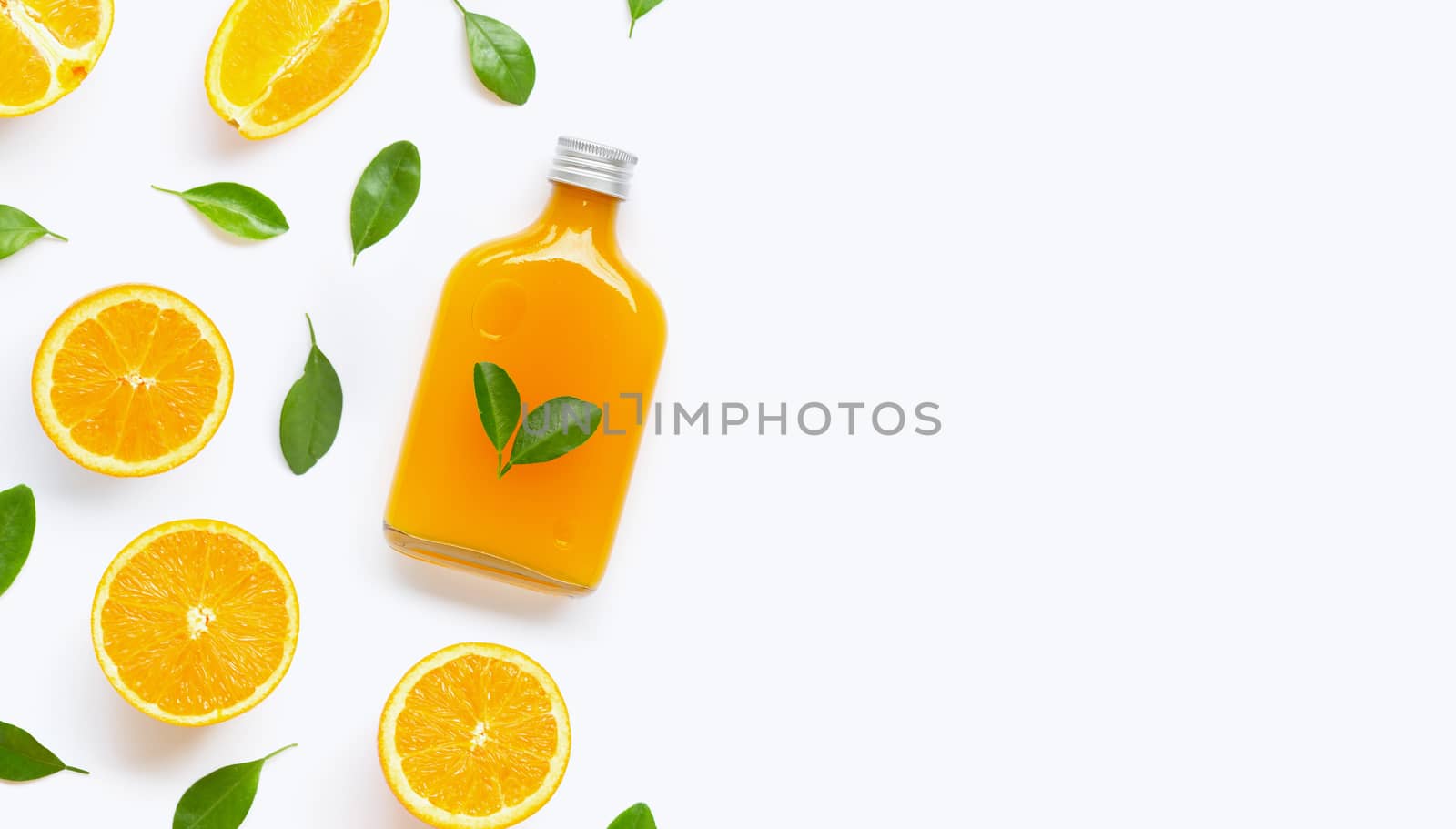 Fresh orange juice with orange fruit on white background. Top view