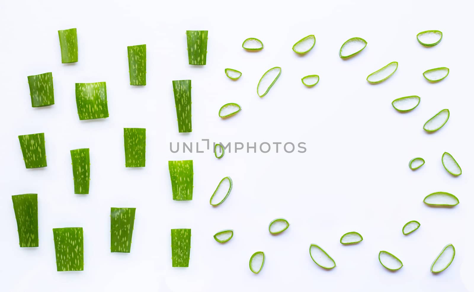 Aloe Vera cut pieces with slices on white background. Copy space