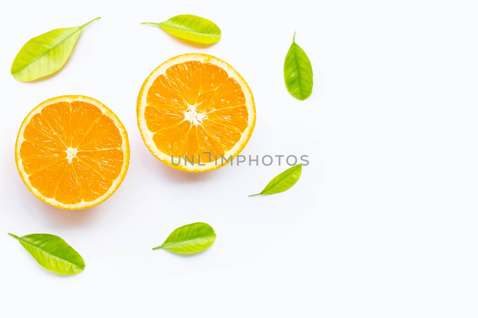 Fresh orange citrus fruit with leaves isolated on white background. Copy space