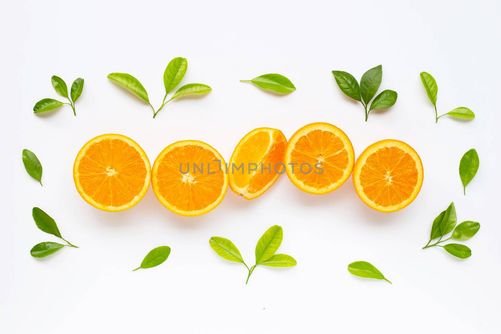High vitamin C. Fresh orange citrus fruit with leaves isolated on white background.