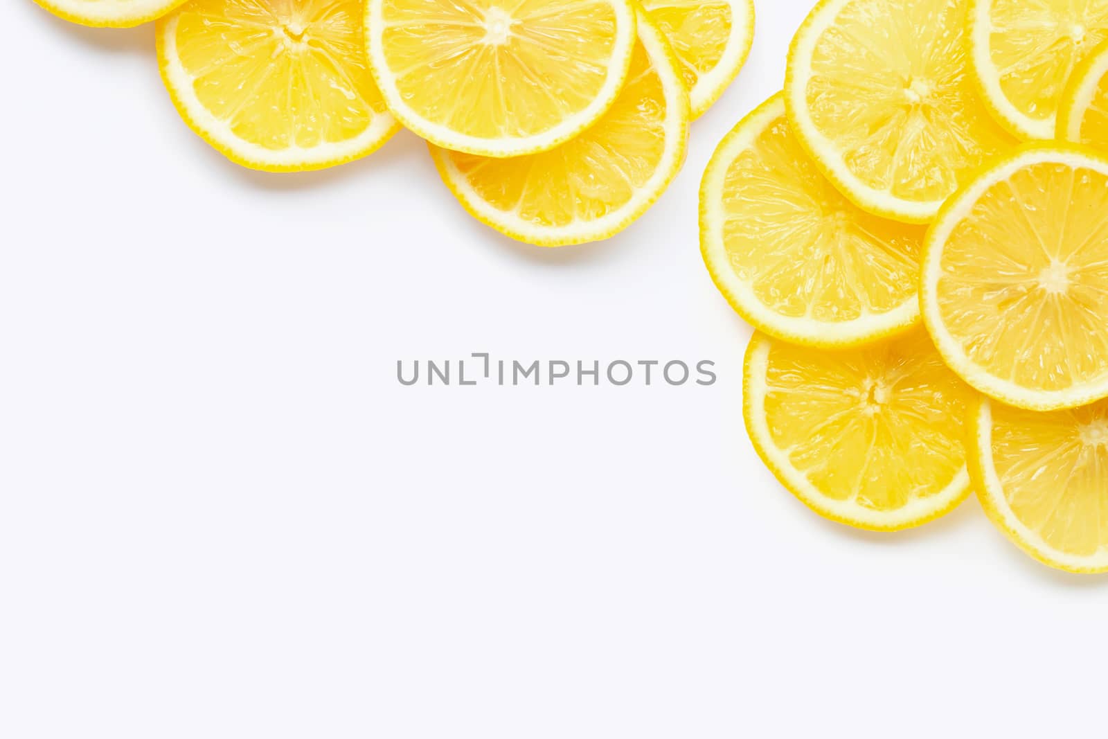 Frame made of fresh lemon with slices on white background. Copy space