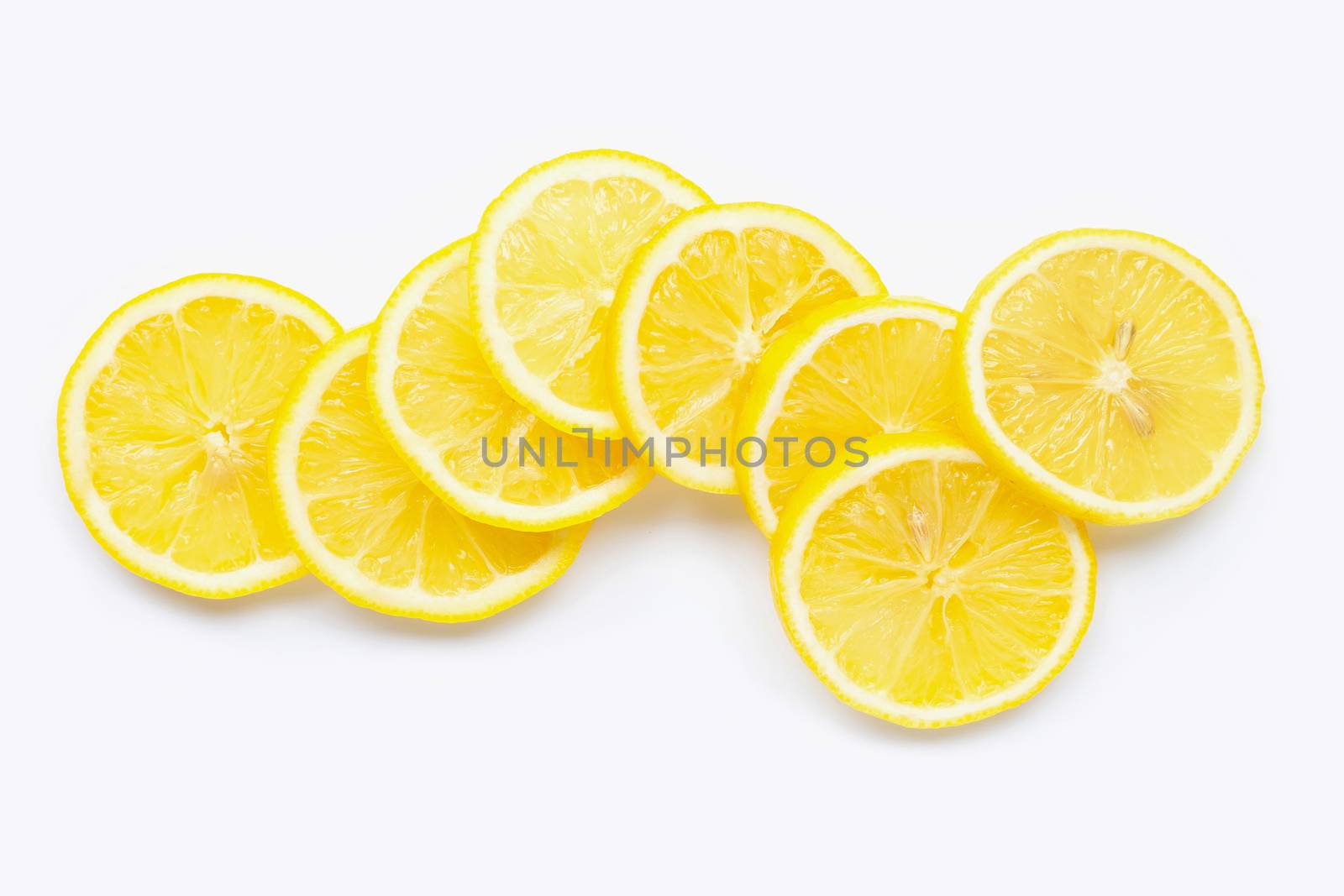 Fresh lemon slices on white background. 