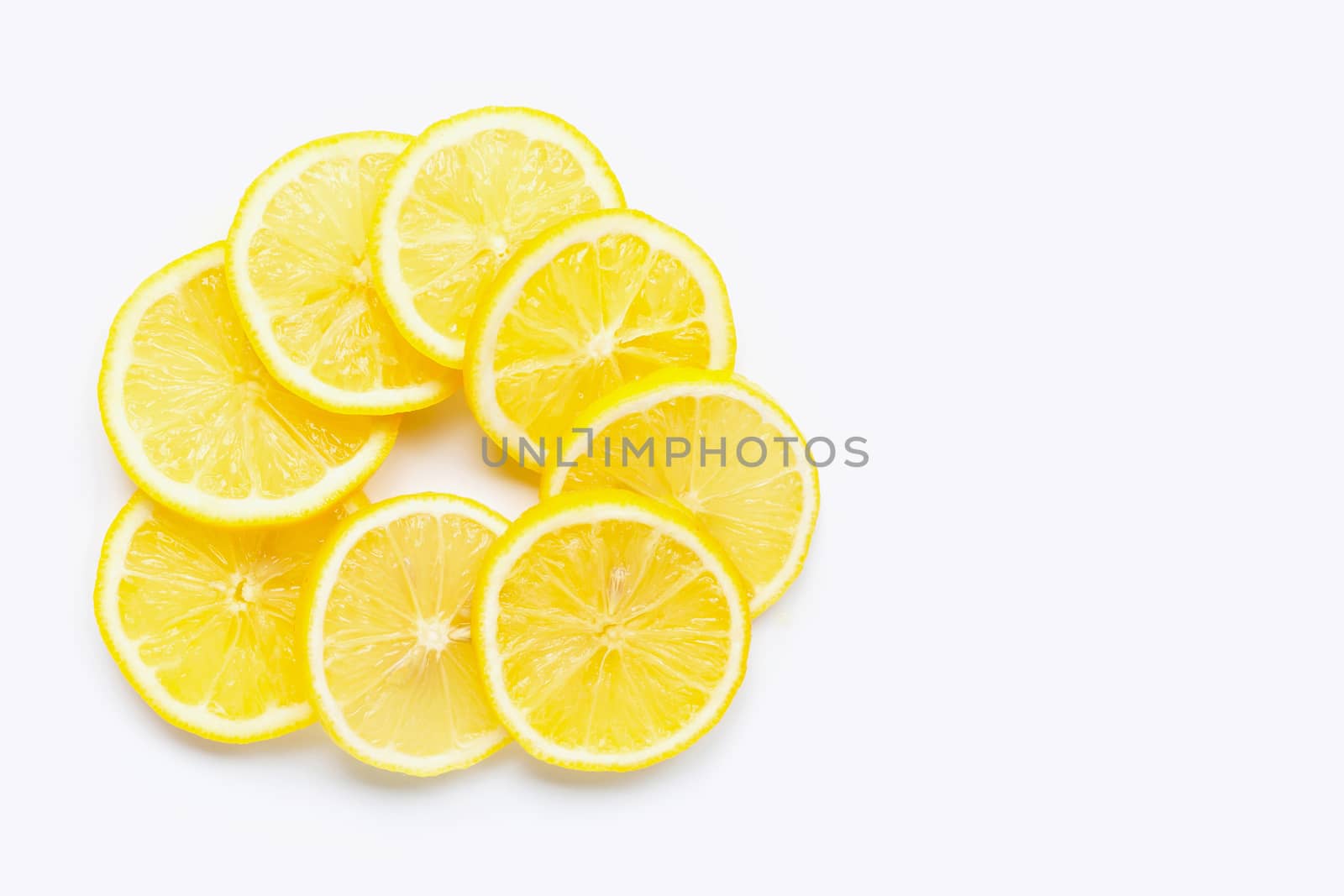 Fresh lemon slices on white background. Copy space