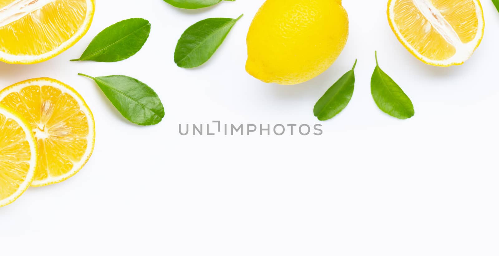 Frame made of fresh lemon and  slices with leaves isolated on white background.