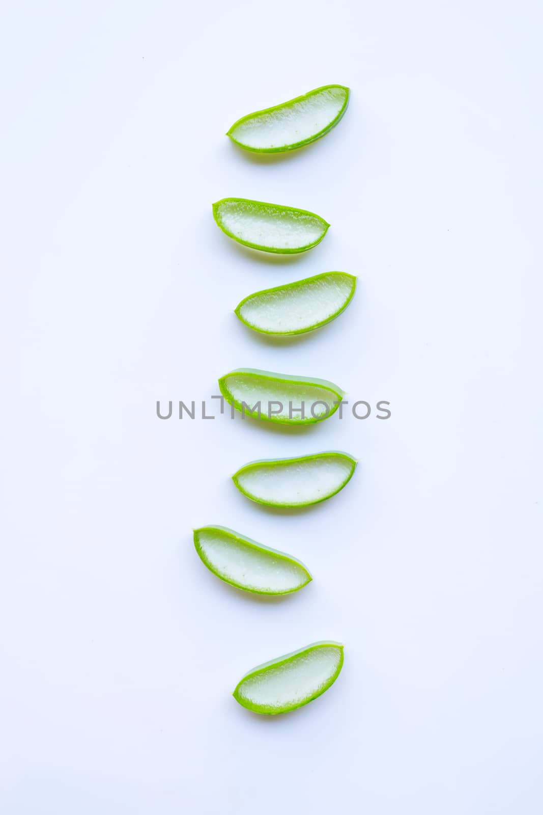 Aloe vera slices on white  by Bowonpat