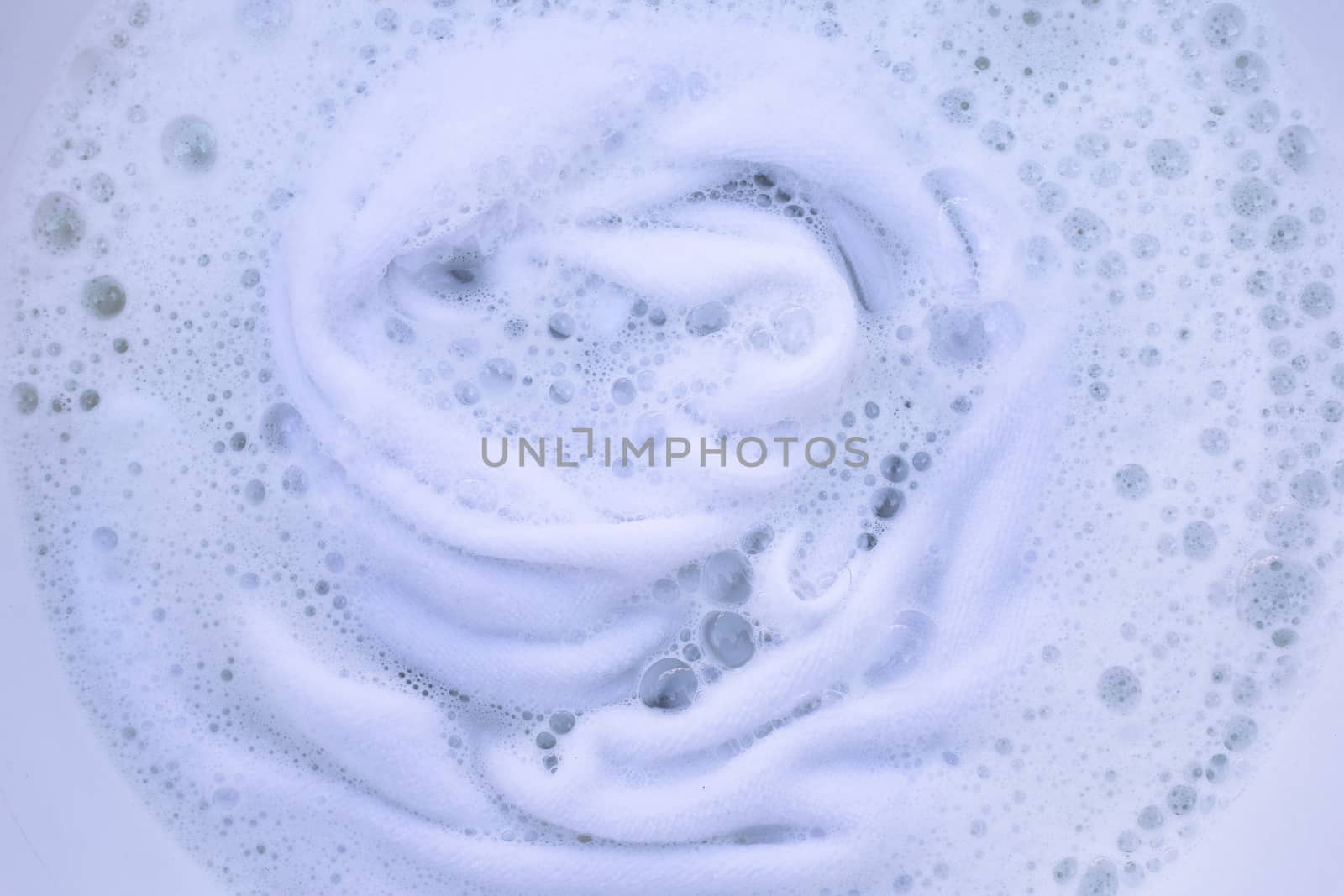 Soak a cloth before washing, white cloth