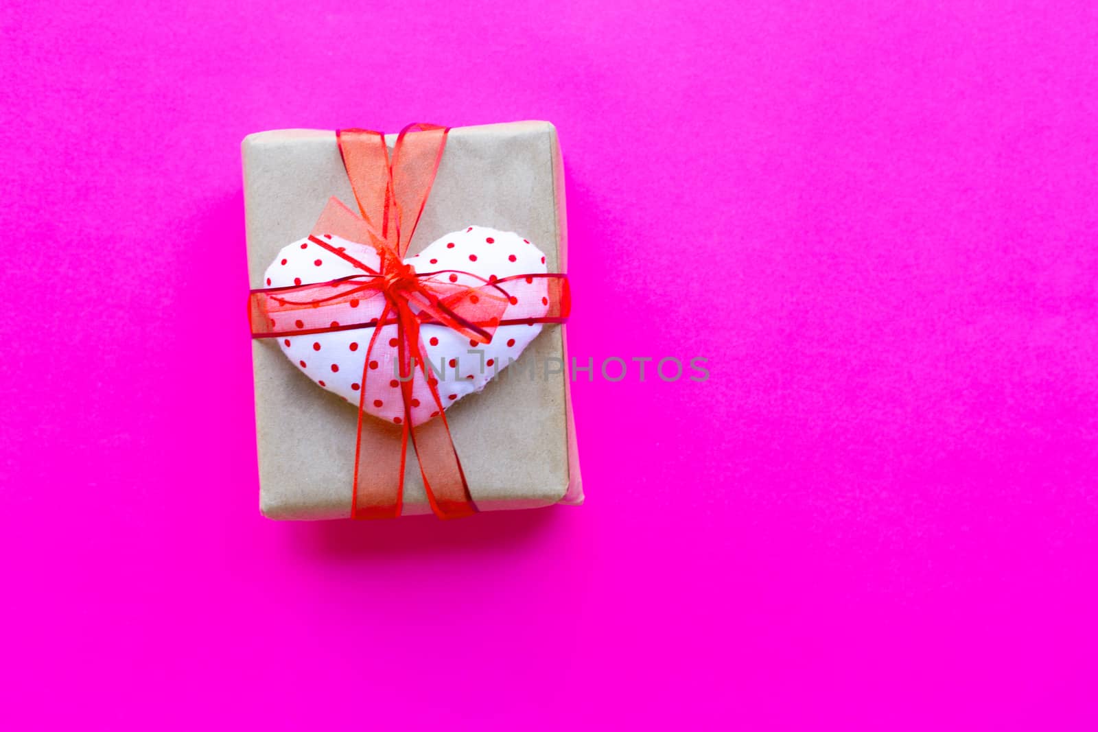 Valentine's day with gift box  on pink background. Top view