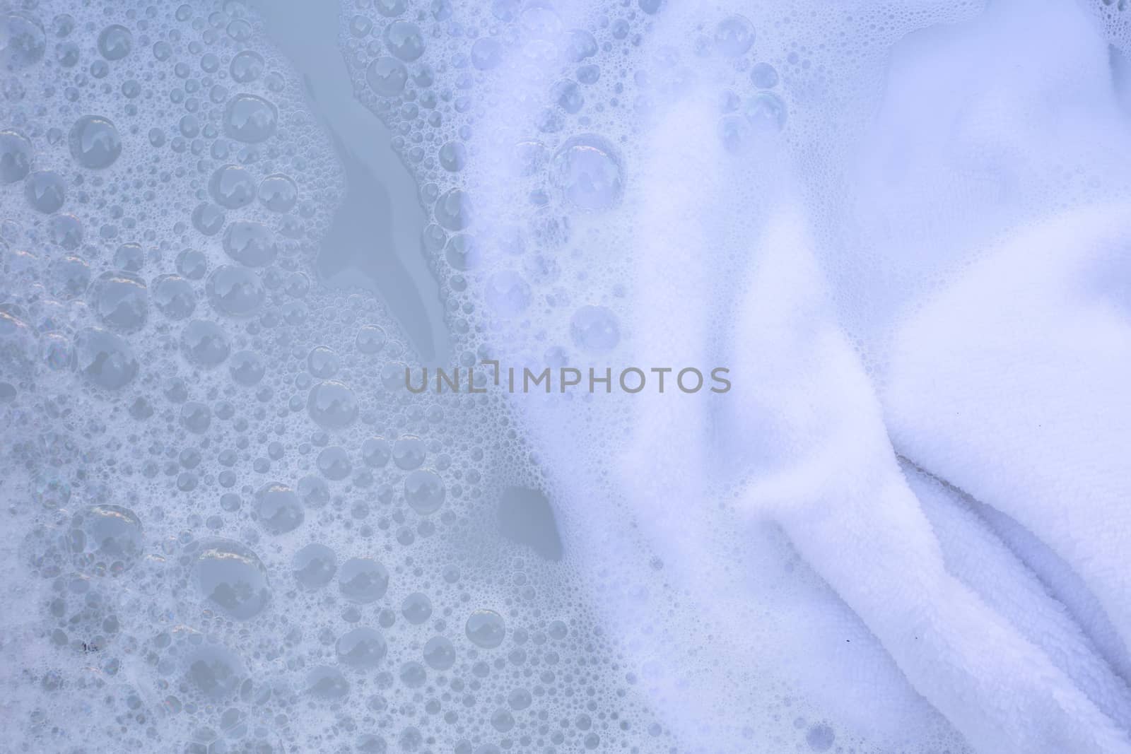 Soak a cloth before washing, white cloth
