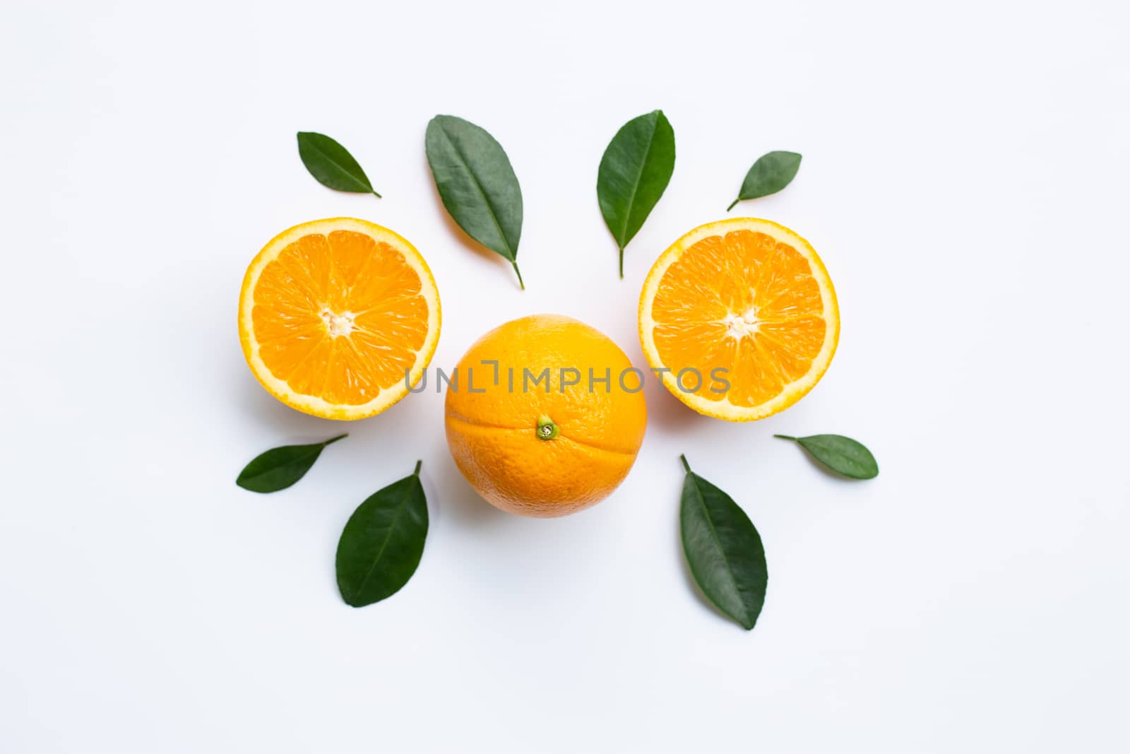 Top view of orange fruits and leaves isolated on white background.