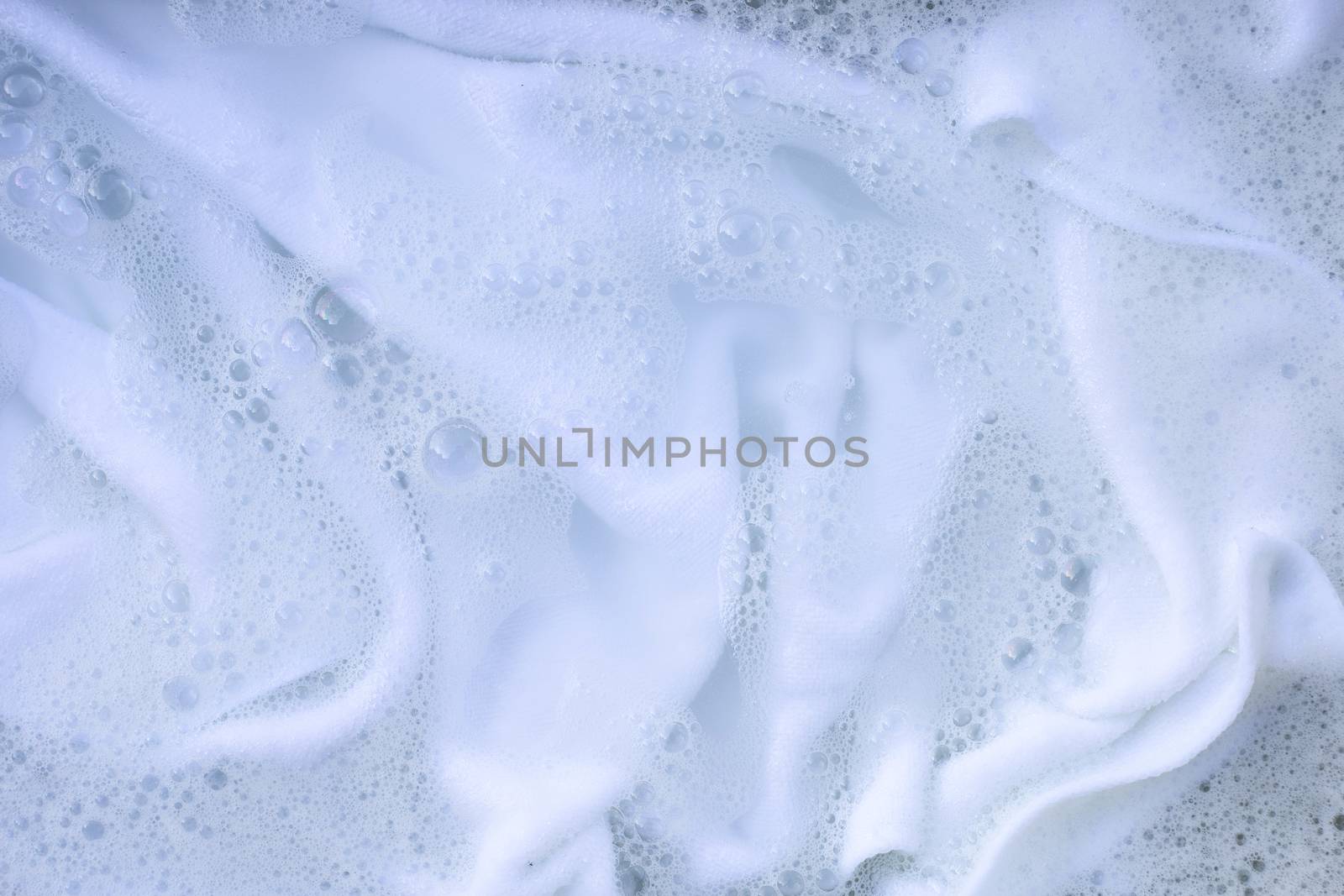 Soak a cloth before washing, white cloth
