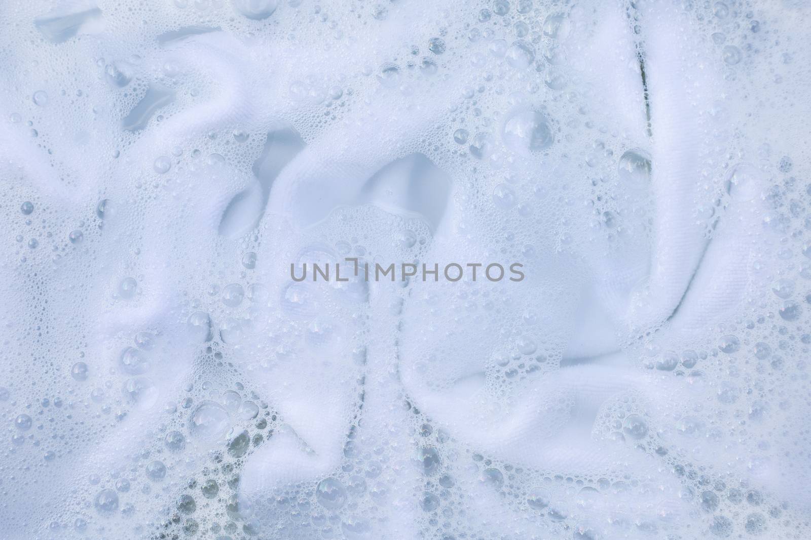 Soak a cloth before washing, white cloth