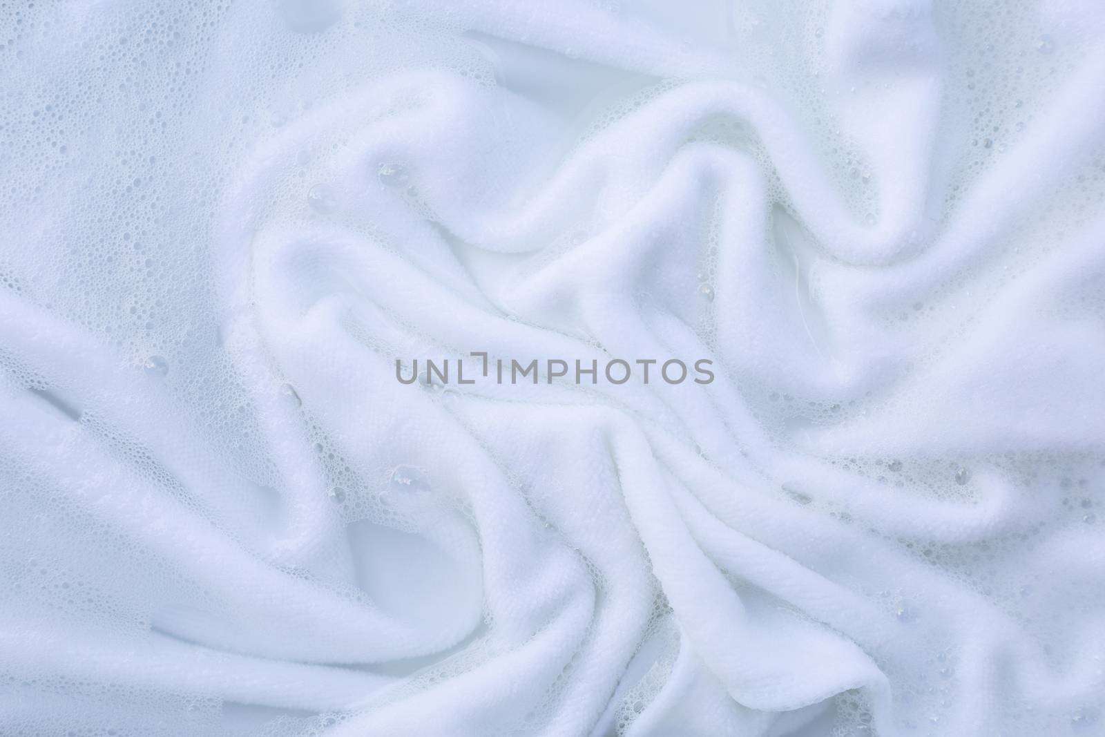 Soak a cloth before washing, white cloth