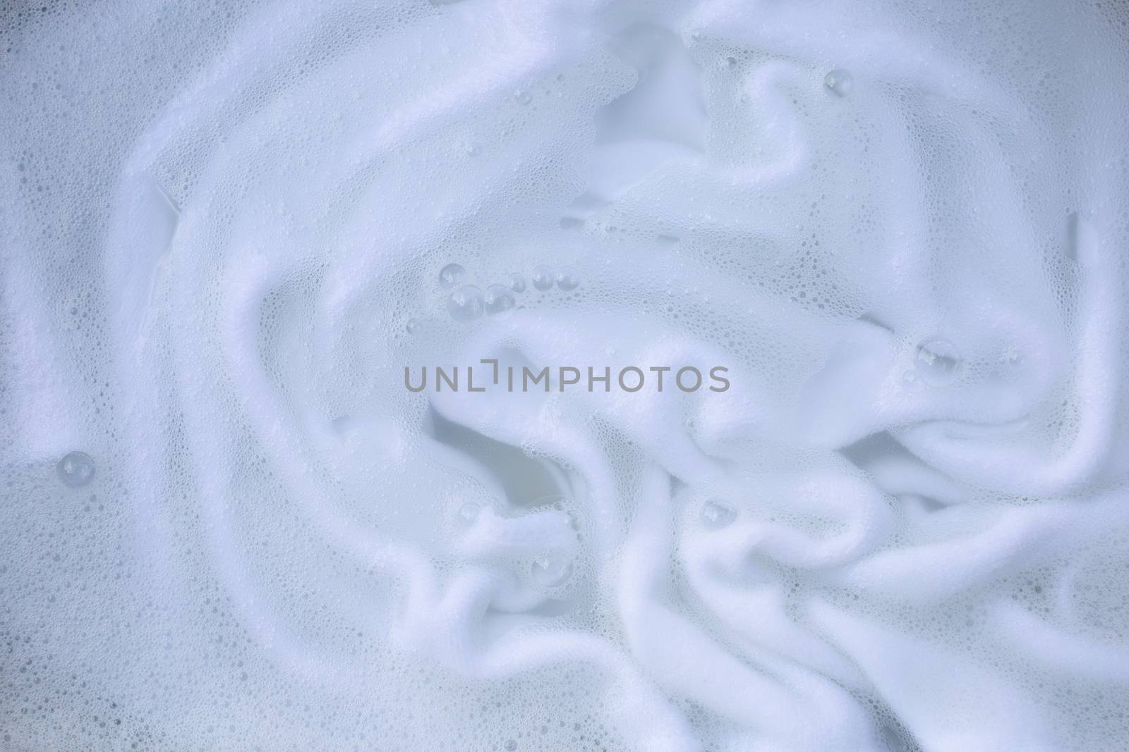 Soak a cloth before washing, white cloth