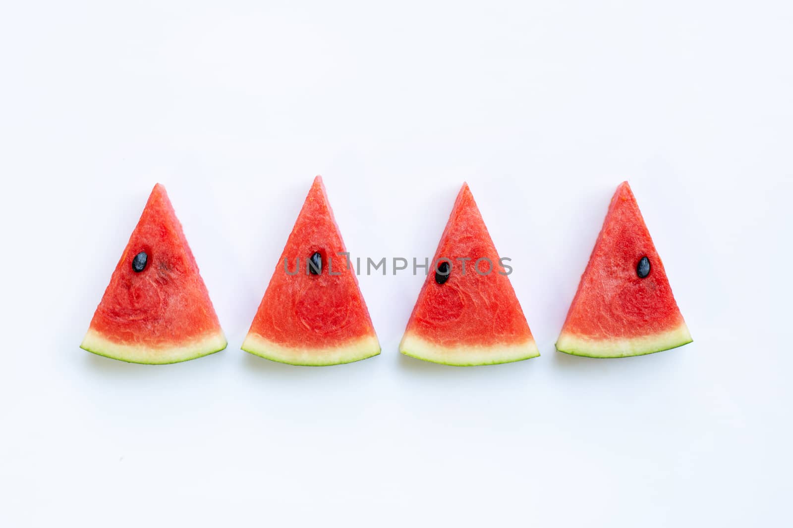Sweet watermelon slices on white background