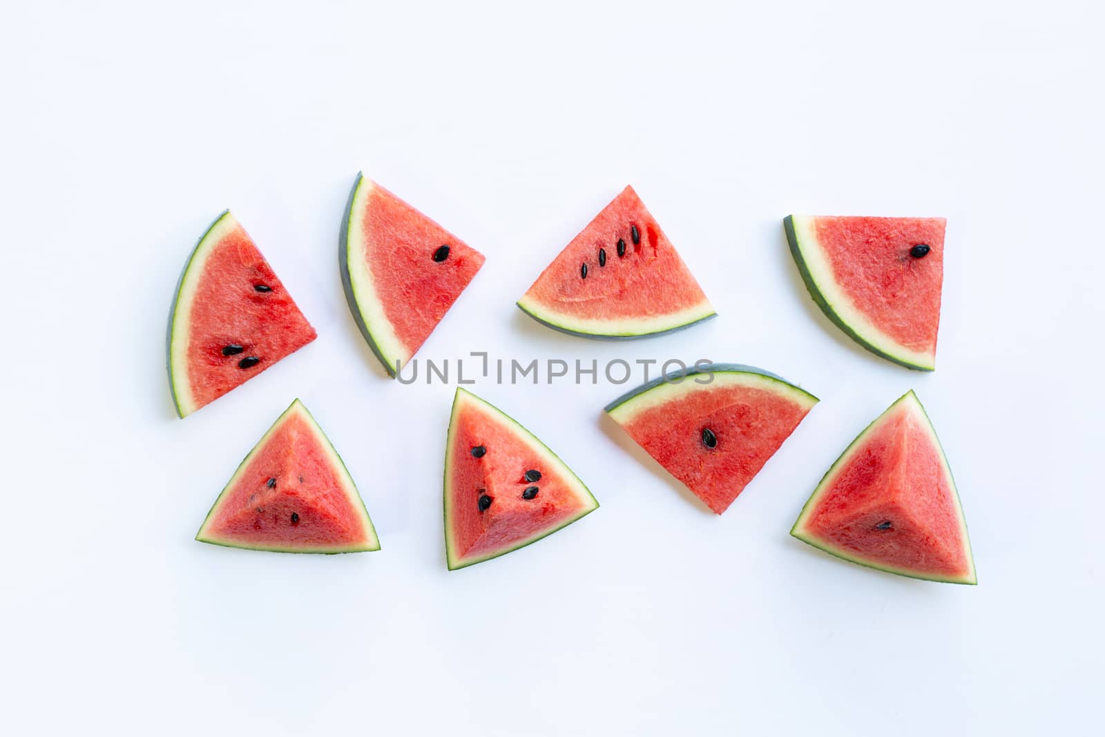 Watermelon pieces on white.