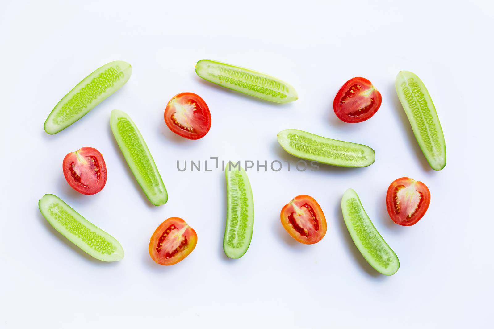 Cucumber, Tomato, Natural ingredients for homemade skin care on white.