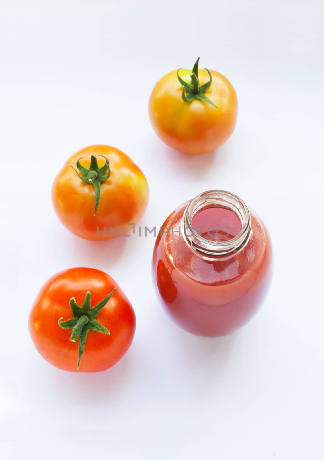 Tomato juice in a glass by Bowonpat