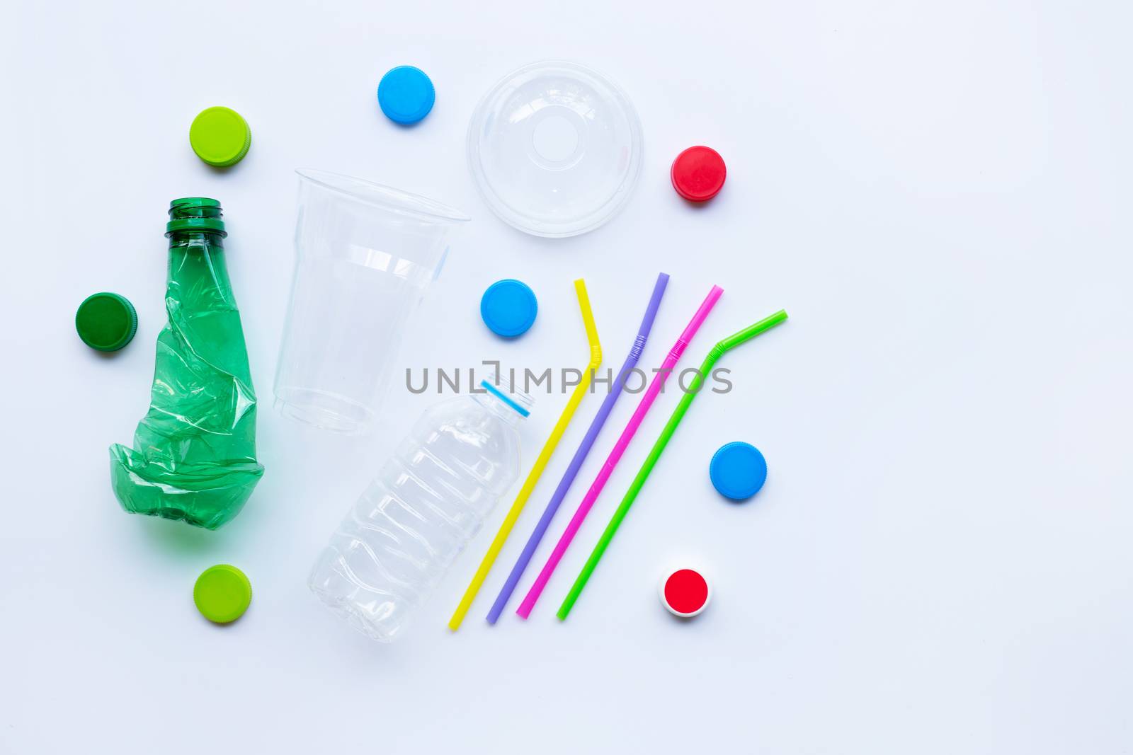 Plastic waste on white background. Top view