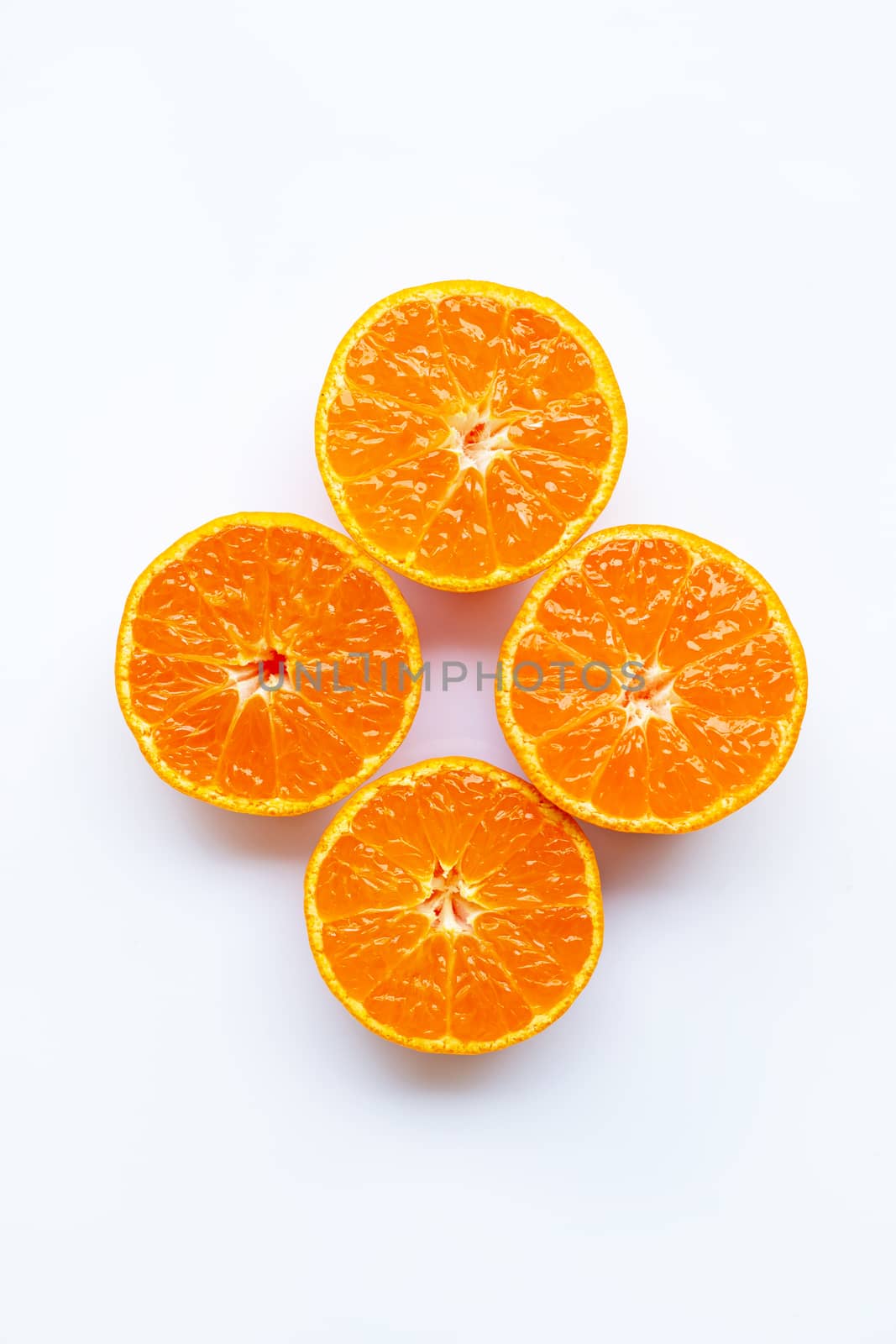 Orange fruits on a white background. Top view