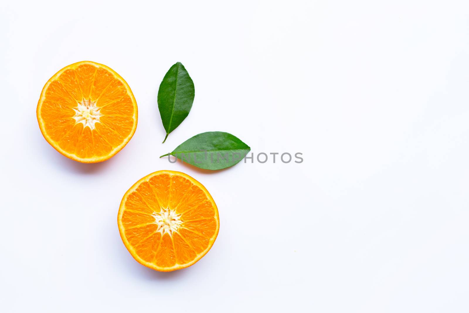 Fresh orange citrus fruits with leaves on white background.  Copy space